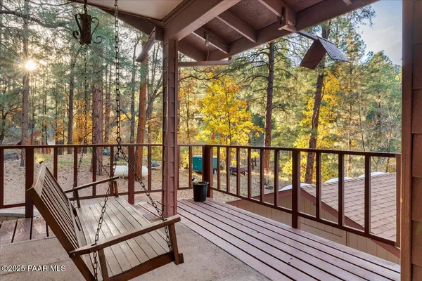 a view of balcony with wooden floor