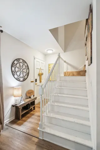 a spacious bedroom with a bed and a couch