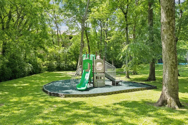 an aerial view of a house with a swimming pool
