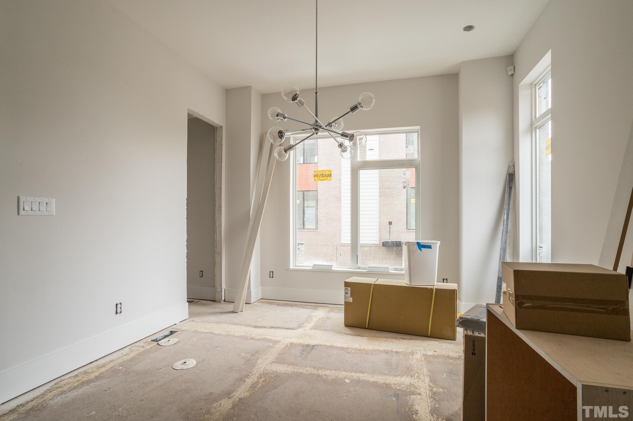 719 Willard Street Durham, NC 27701 - Photo 6 of 24 a spacious bathroom with a large tub shower and windows