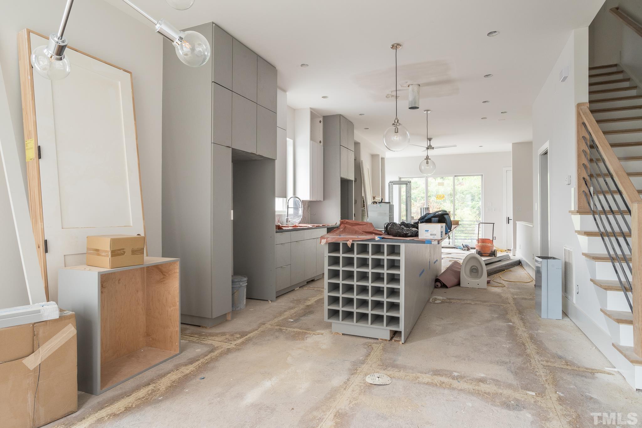 719 Willard Street Durham, NC 27701 - Photo 7 of 24 a living room with furniture a dining table and chairs