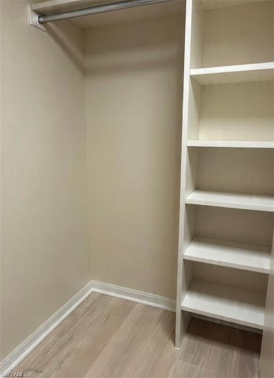 121 Ginger Road Venice, FL 34293 - Photo 14 of 34 a view of an empty walk in closet