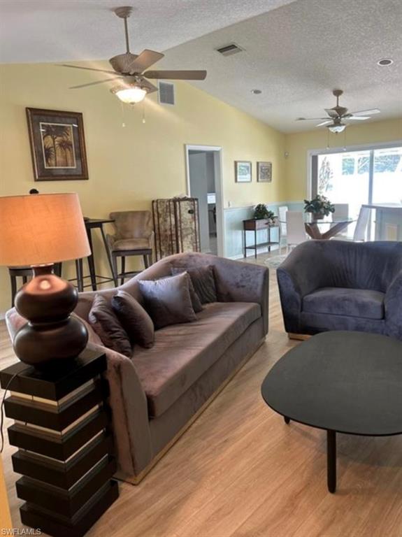 121 Ginger Road Venice, FL 34293 - Photo 18 of 34 a living room with furniture and a wooden floor