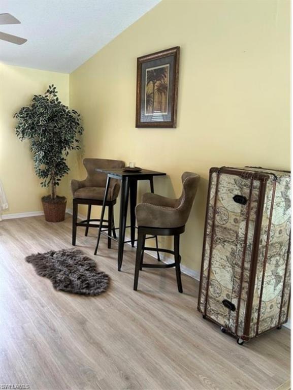 121 Ginger Road Venice, FL 34293 - Photo 19 of 34 a living room with furniture and a potted plant