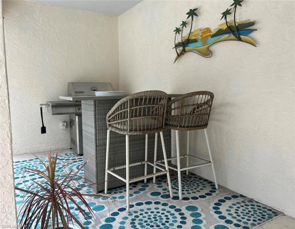 121 Ginger Road Venice, FL 34293 - Photo 25 of 34 a picture of a table and a potted plant