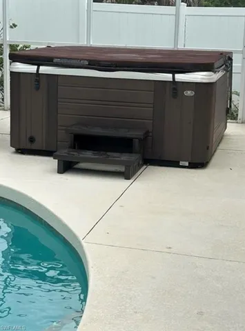 a stove top oven sitting inside of a kitchen