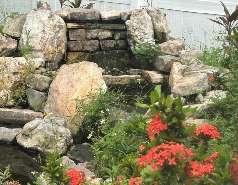 121 Ginger Road Venice, FL 34293 - Photo 28 of 34 a close up of a flower pot