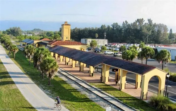a view of a swimming pool with a yard