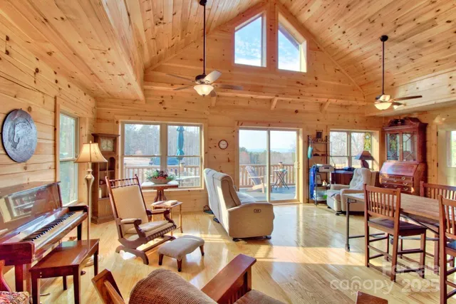 a very nice looking living room with a large window