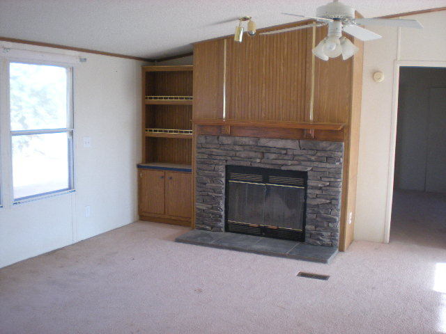 15941 North Warren Road Maricopa, AZ 85139 - Photo 3 of 5 Stone Fireplace