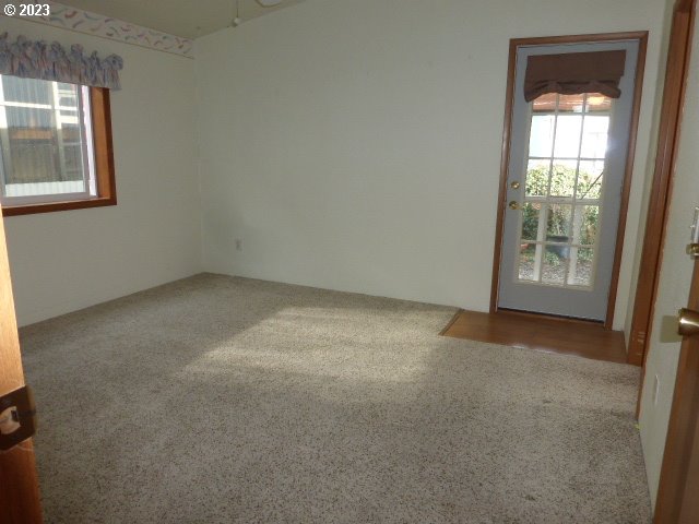 100 River Bend Road, Unit 80 Reedsport, OR 97467 - Photo 12 of 22 an empty room with windows