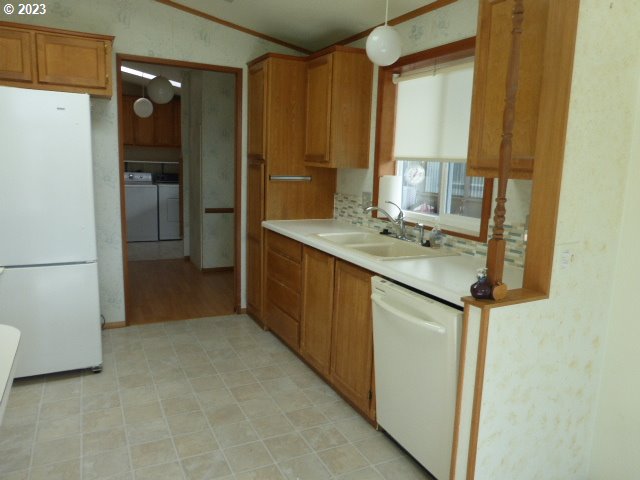 100 River Bend Road, Unit 80 Reedsport, OR 97467 - Photo 9 of 22 a bathroom with a sink and a mirror