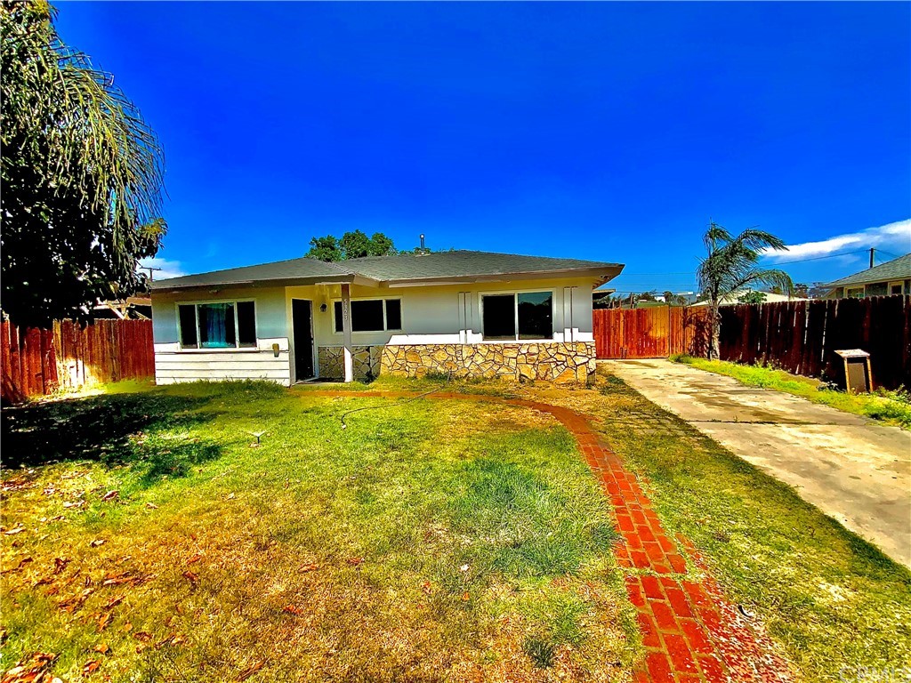 5323 El Rio Avenido Riverside, CA 92509 - Photo 1 of 1 a swimming pool with outdoor seating and yard