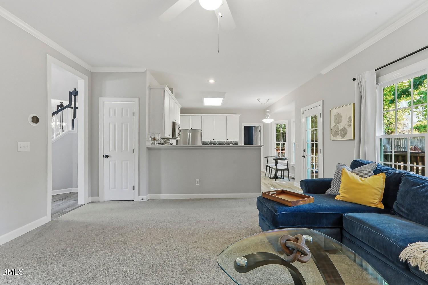 4001 Batiste Road Raleigh, NC 27613 - Photo 14 of 63 a living room with furniture and kitchen view