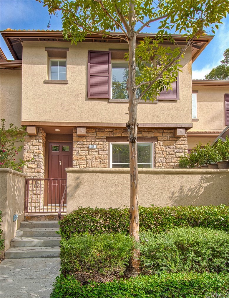 83 Sapphire, Unit 46 Irvine, CA 92602 - Photo 1 of 18 a open kitchen with white cabinets and stainless steel appliances