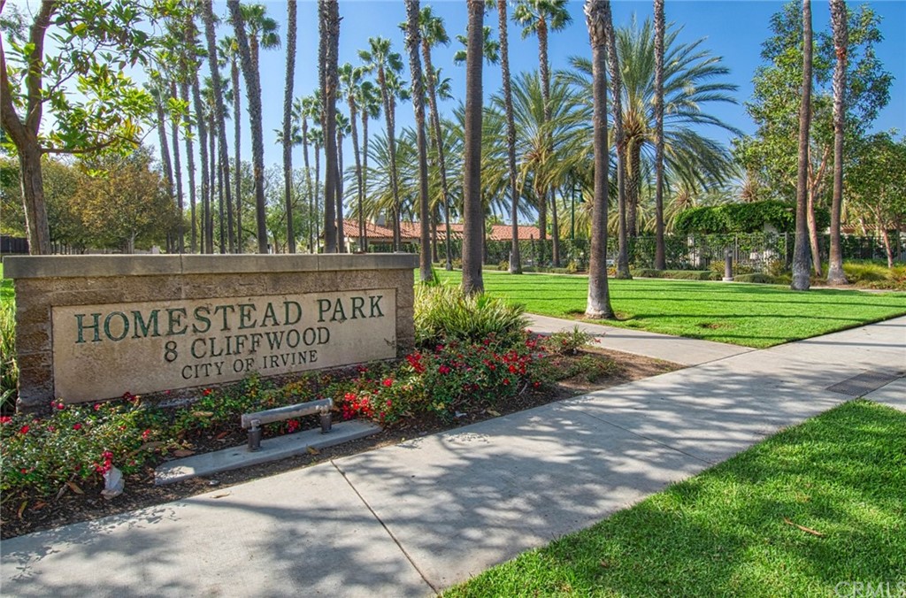 83 Sapphire, Unit 46 Irvine, CA 92602 - Photo 16 of 18 a sign on the side of the road