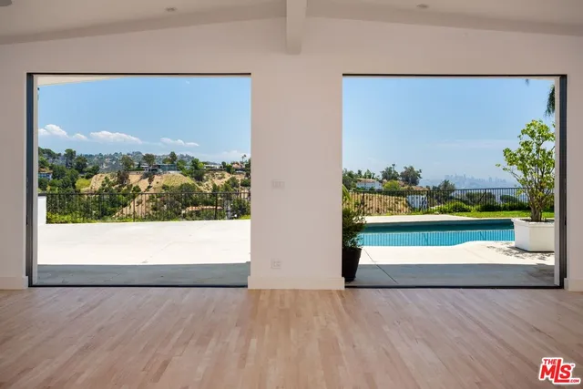 a view of swimming pool with a yard