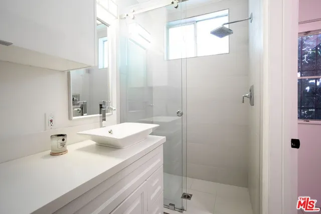 a view of a house with swimming pool and a yard