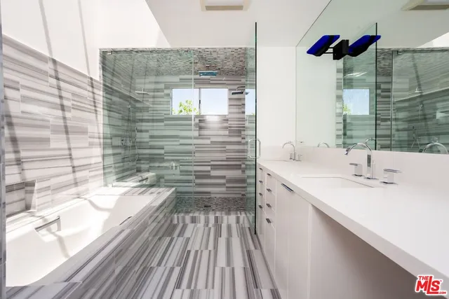 a bathroom with a sink and a bathtub