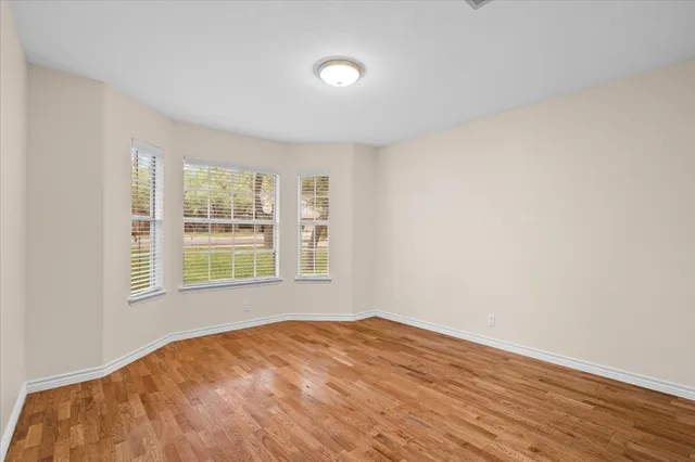 a bathroom with a double vanity sink mirror and