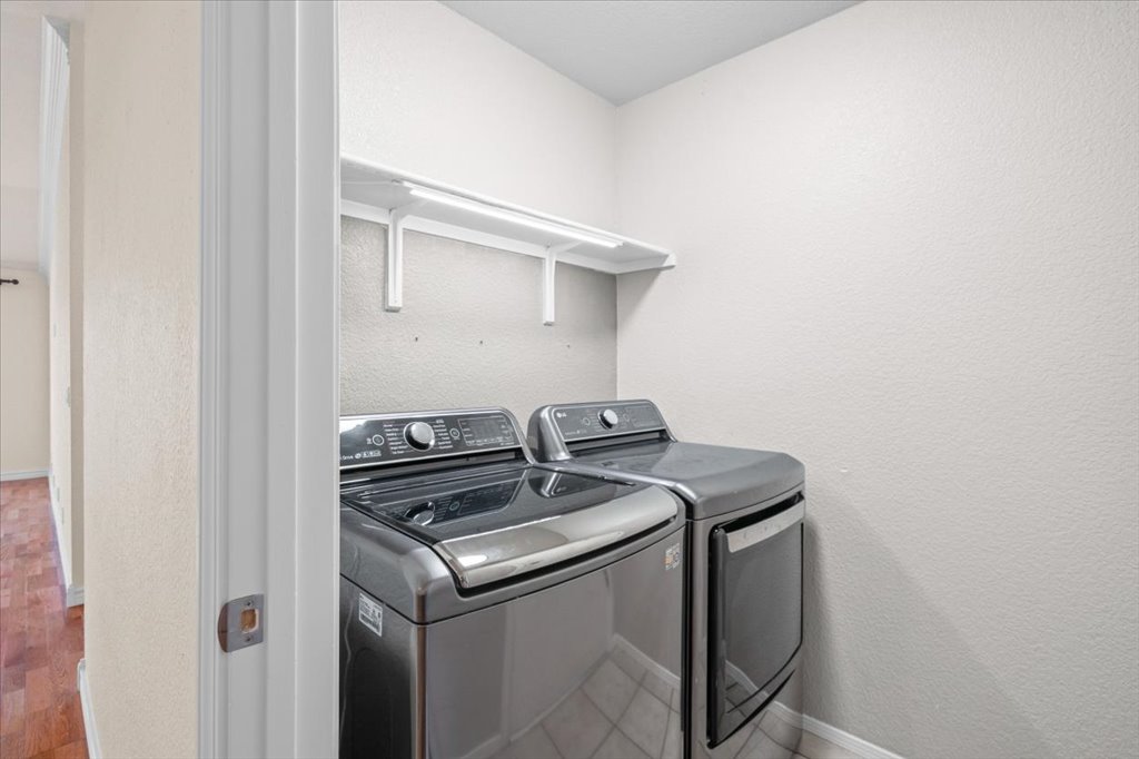 8111 Davis Mountain Pass Austin, TX 78726 - Photo 21 of 37 a utility room with dryer and washer
