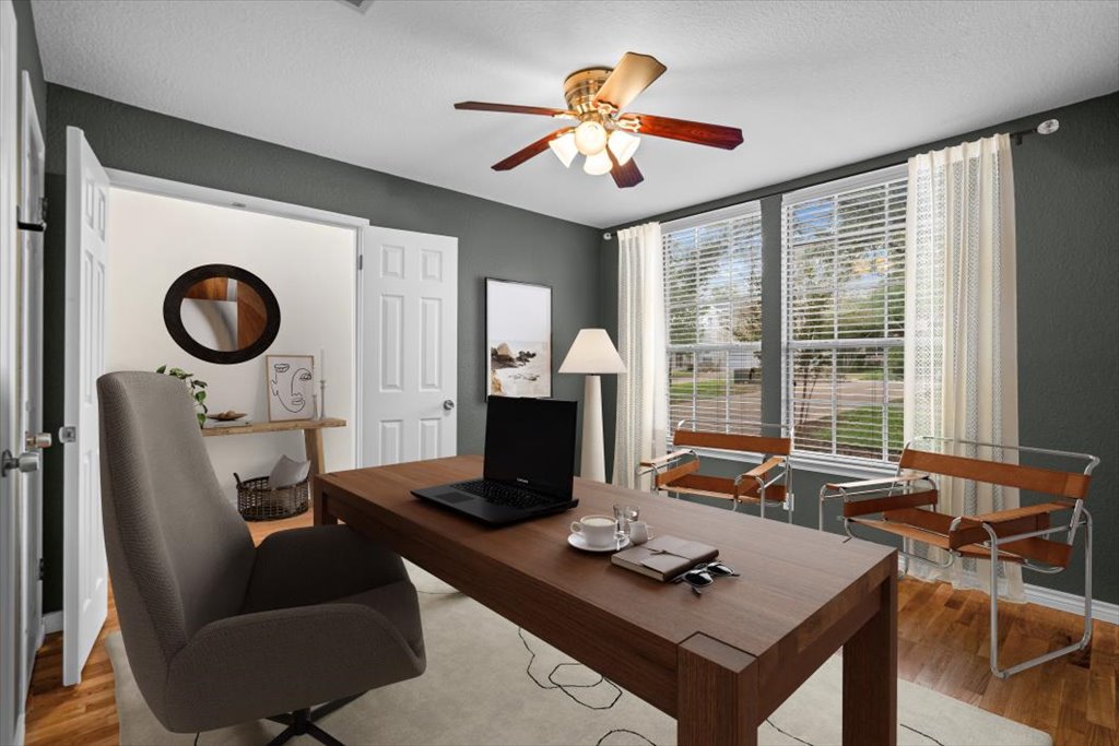 8111 Davis Mountain Pass Austin, TX 78726 - Photo 8 of 37 a view of a workspace with furniture