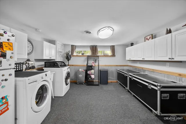 a bathroom with a sink mirror toilet and shower