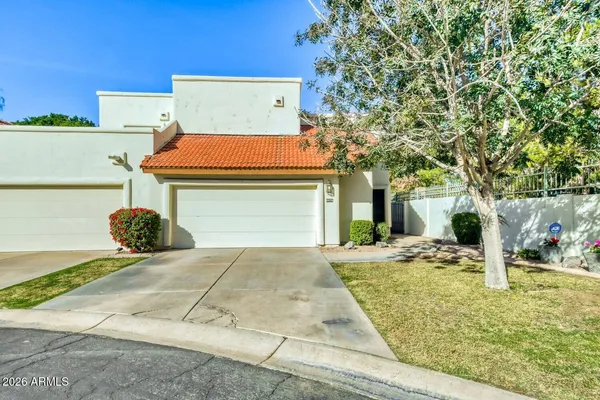 a view of a backyard of a house