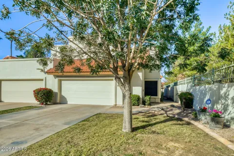 a view of a house with outdoor space and sitting area