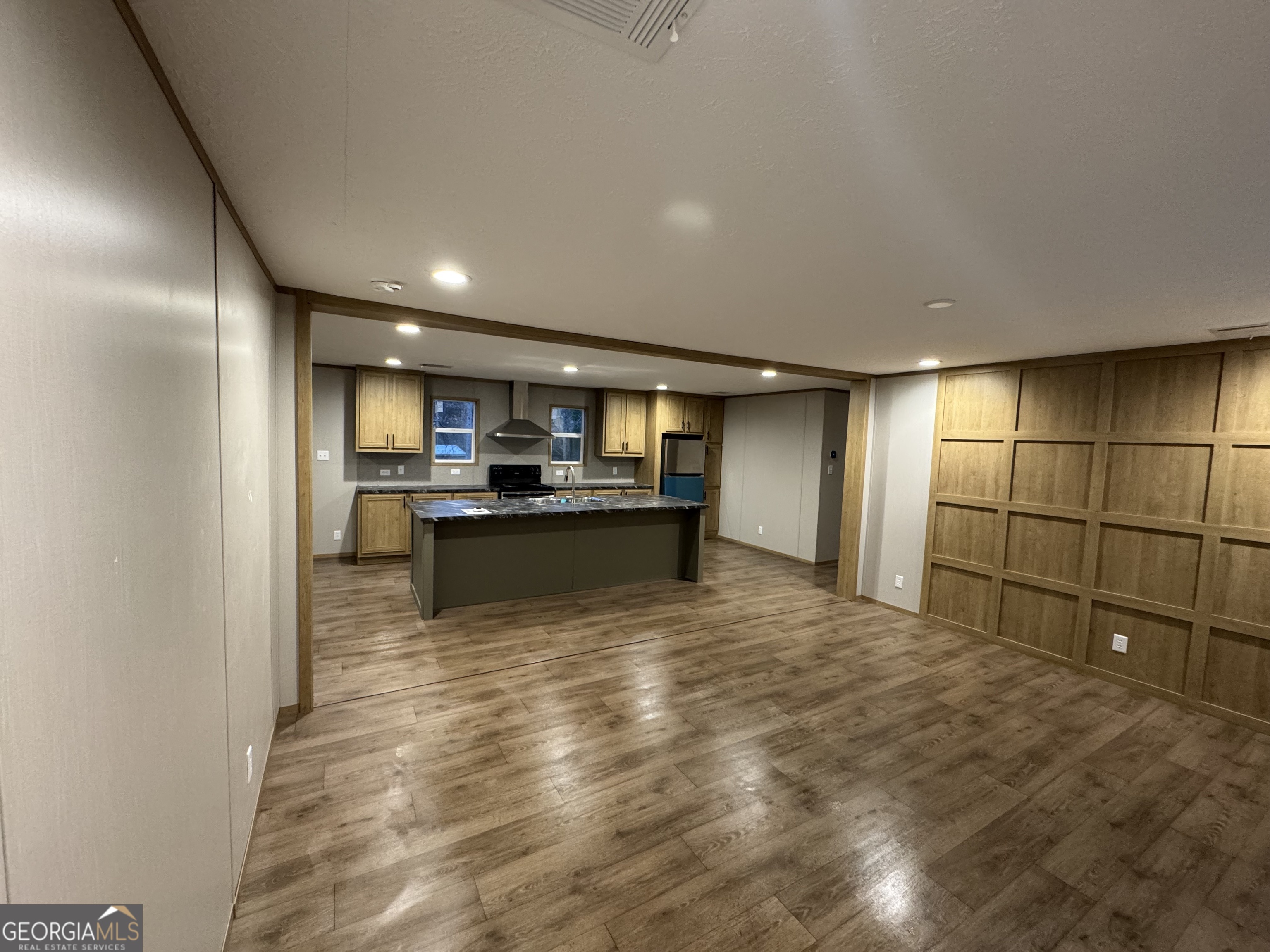 215 Poplar Circle West Point, GA 31833 - Photo 4 of 15 a view of kitchen with kitchen island and stainless steel appliances