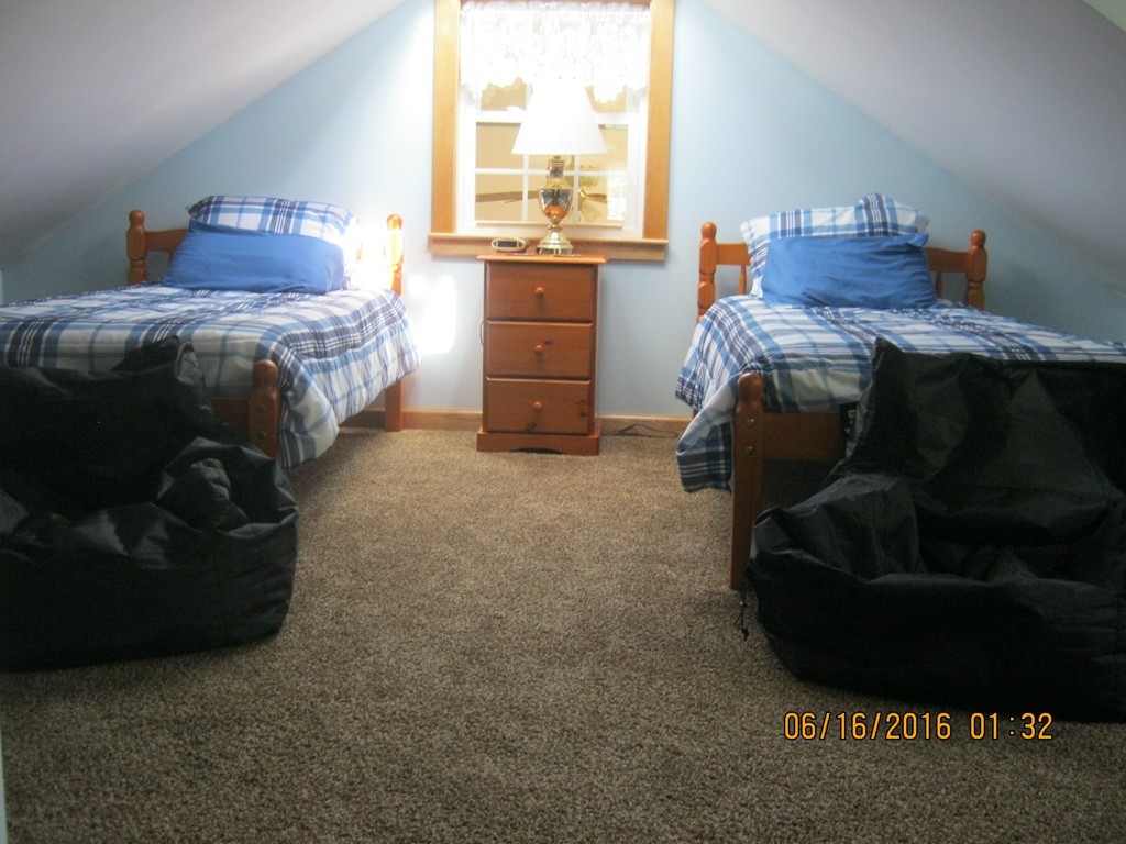 220 Davis Road Ashby, MA 01431 - Photo 15 of 30 a bedroom with a bed and a window