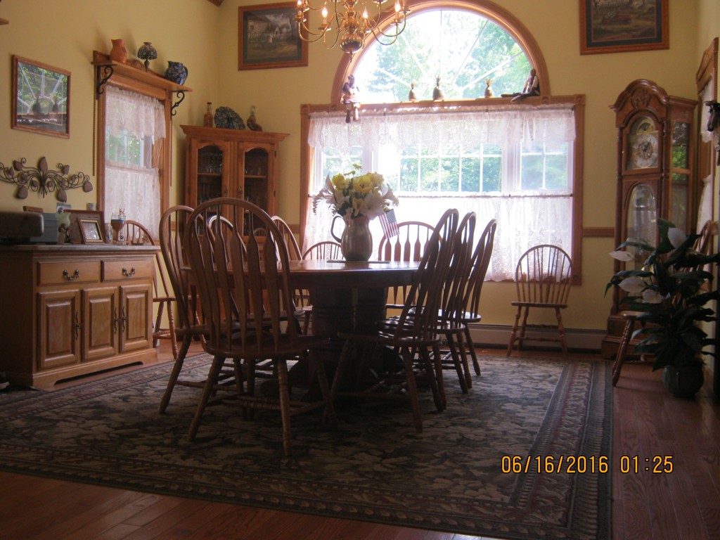 220 Davis Road Ashby, MA 01431 - Photo 6 of 30 a view of a dining room with furniture window and wooden floor