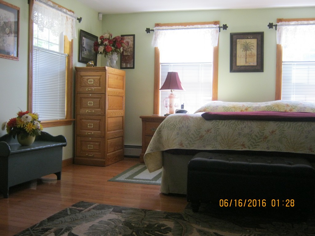 220 Davis Road Ashby, MA 01431 - Photo 10 of 30 a bedroom with a bed and a dresser
