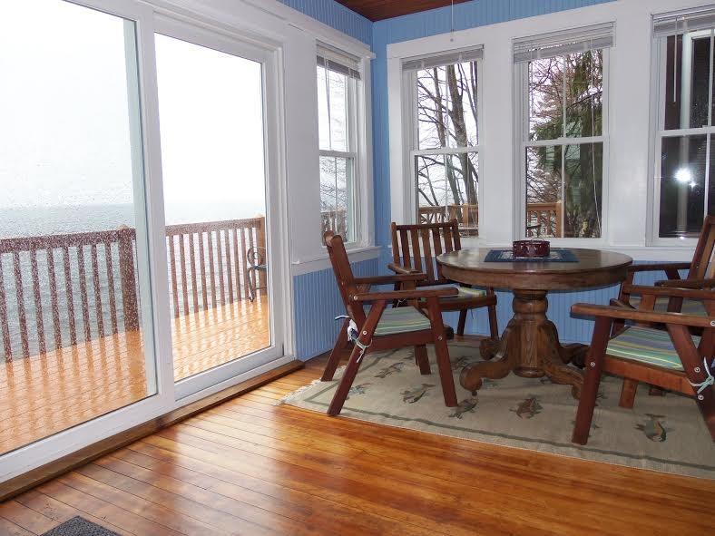 11 Sebaik Road Sebago, ME 04029 - Photo 6 of 35 SUN PORCH PROVIDE TRANQUIL VIEWS OF...