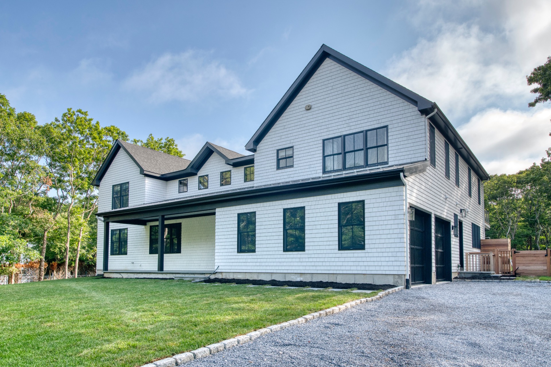 497 Toppings Path Sag Harbor, NY 11963 - Photo 12 of 12 a view of a yard in front of a house