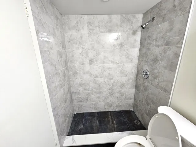 a bathroom with a sink and a shower curtain