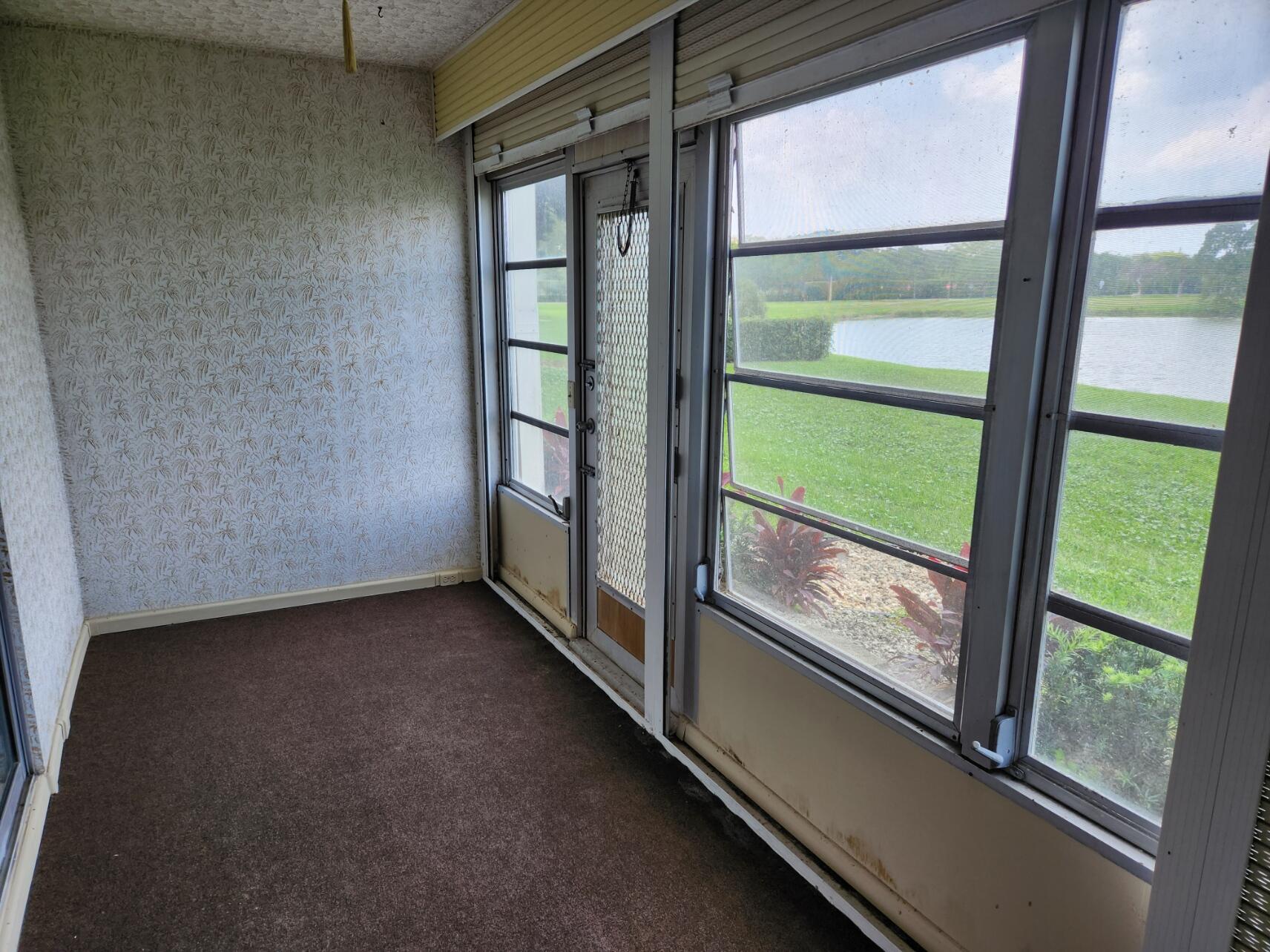 1059 Ainslie Drive, Unit 1059 Boca Raton, FL 33434 - Photo 3 of 15 a view of a room with window