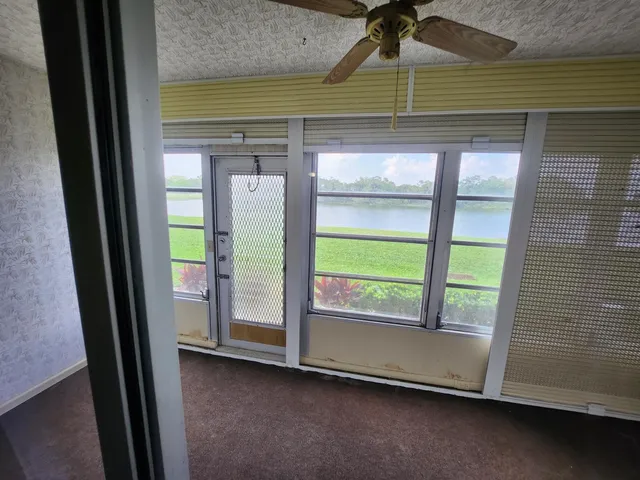 a room that has a bed and a window