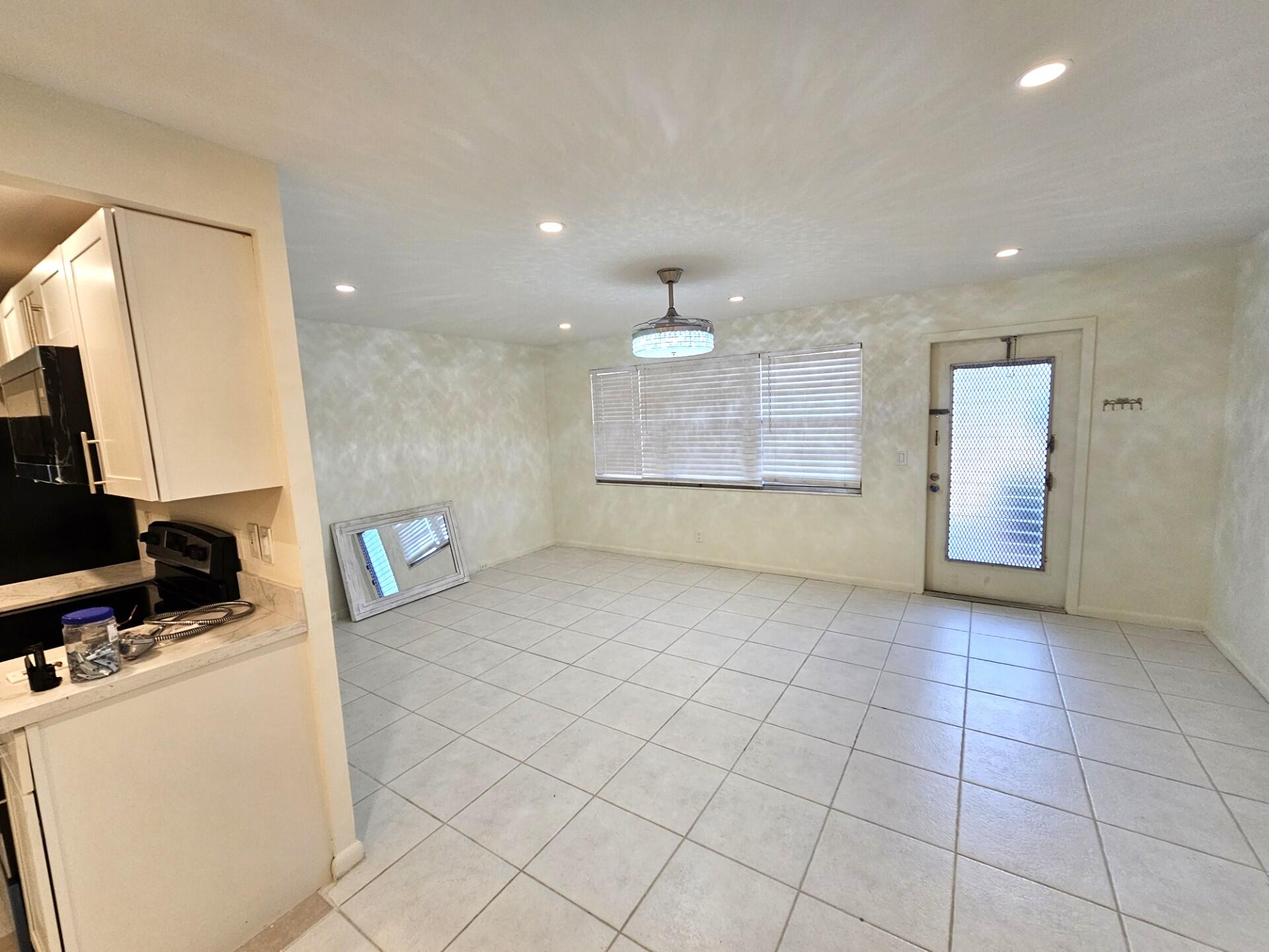 1059 Ainslie Drive, Unit 1059 Boca Raton, FL 33434 - Photo 7 of 15 a view of a kitchen with a sink