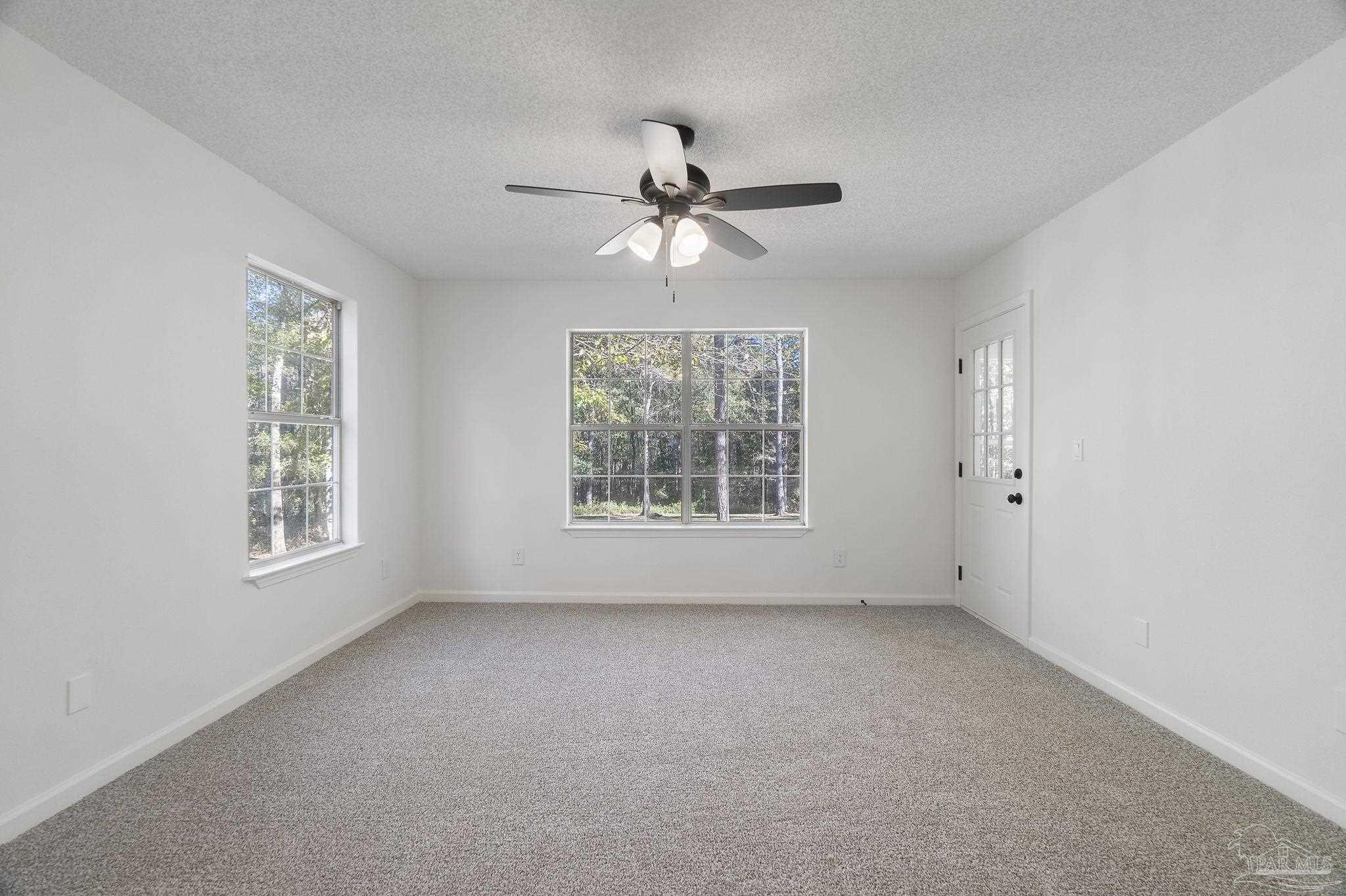 195 Miller Road DeFuniak Springs, FL 32435 - Photo 27 of 50 a view of an empty room with a window