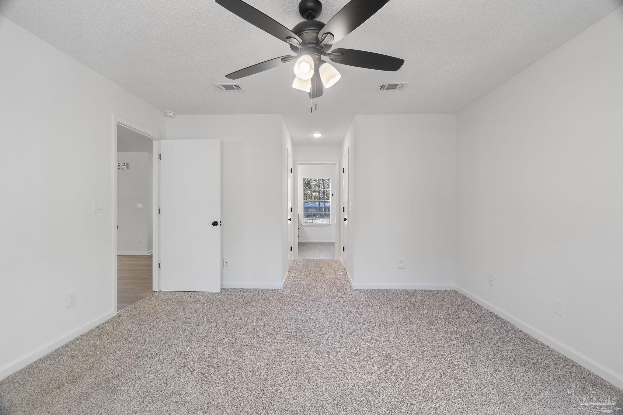 195 Miller Road DeFuniak Springs, FL 32435 - Photo 28 of 50 wooden floor in an empty room