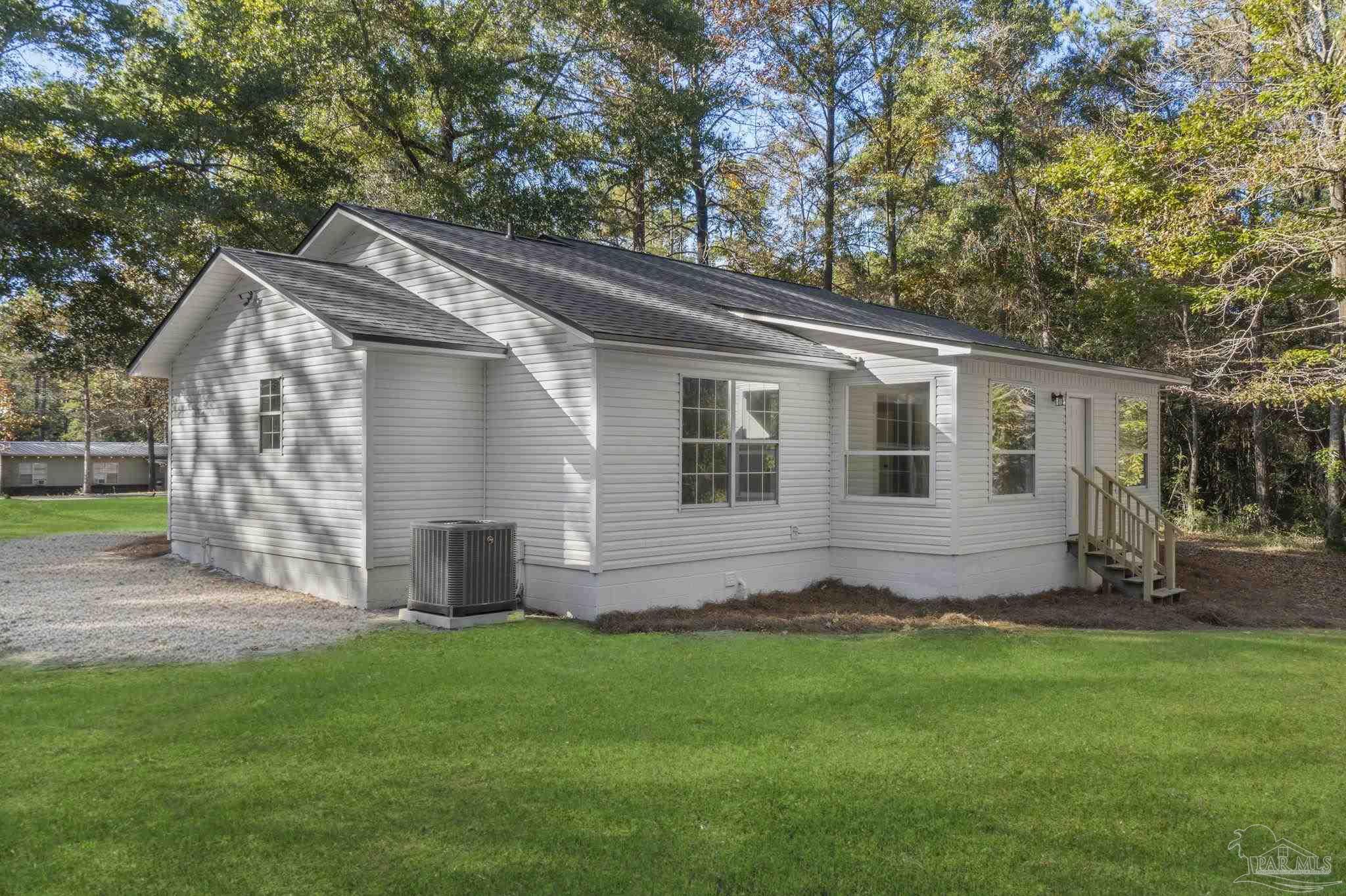 195 Miller Road DeFuniak Springs, FL 32435 - Photo 34 of 50 a view of house with backyard