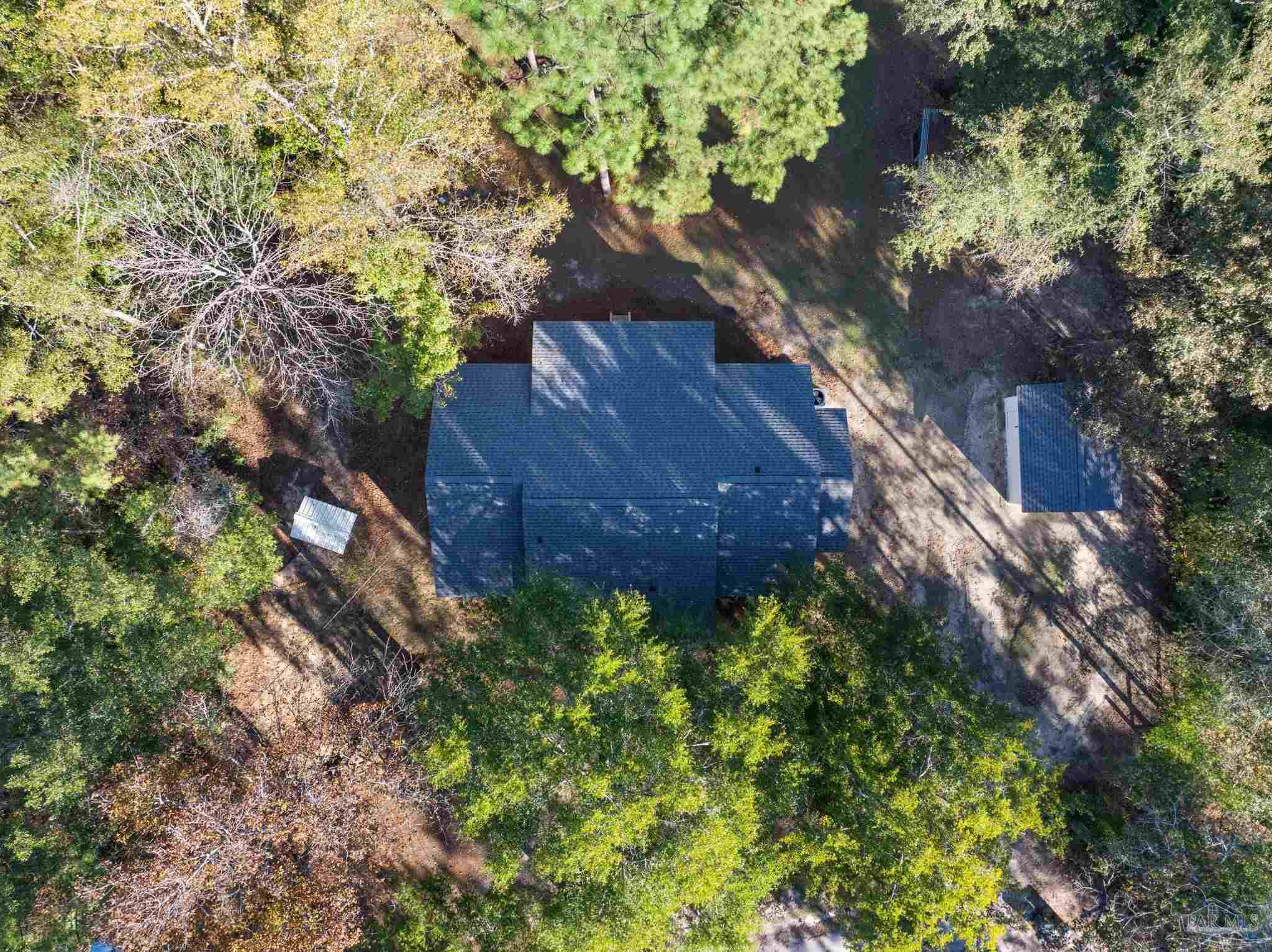 195 Miller Road DeFuniak Springs, FL 32435 - Photo 47 of 50 a view of a house with a tree