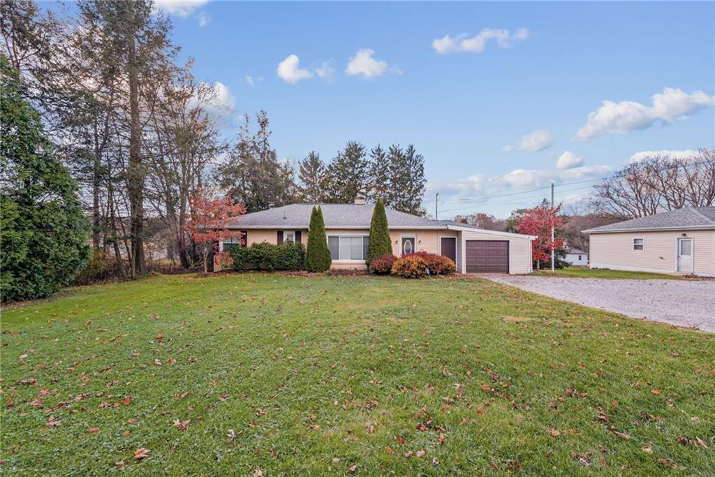 104 Ekastown Road Sarver, PA 16055 - Photo 2 of 39 a view of a house with a yard and sitting area