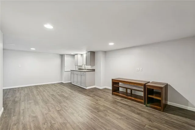 a view of kitchen and wooden floor