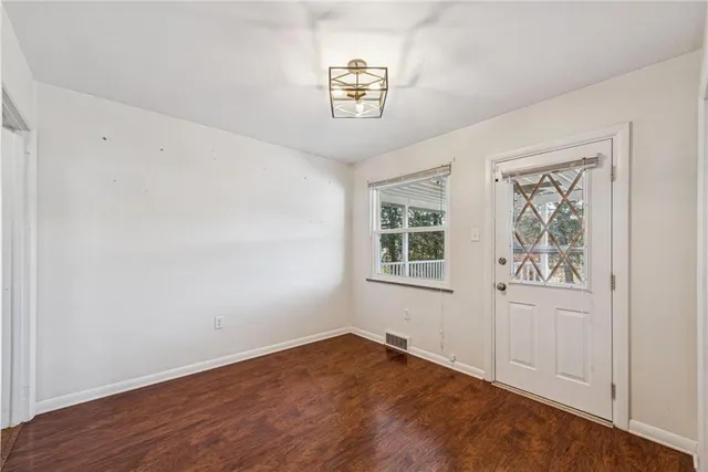 an empty room with windows