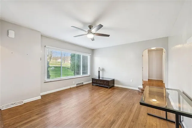 a view of workspace with furniture and window