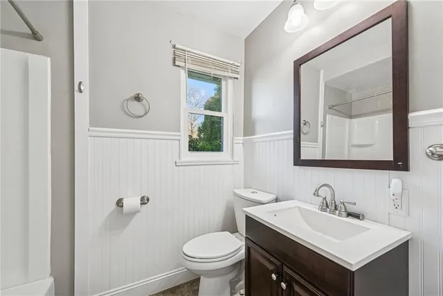 a bathroom with a sink and a toilet