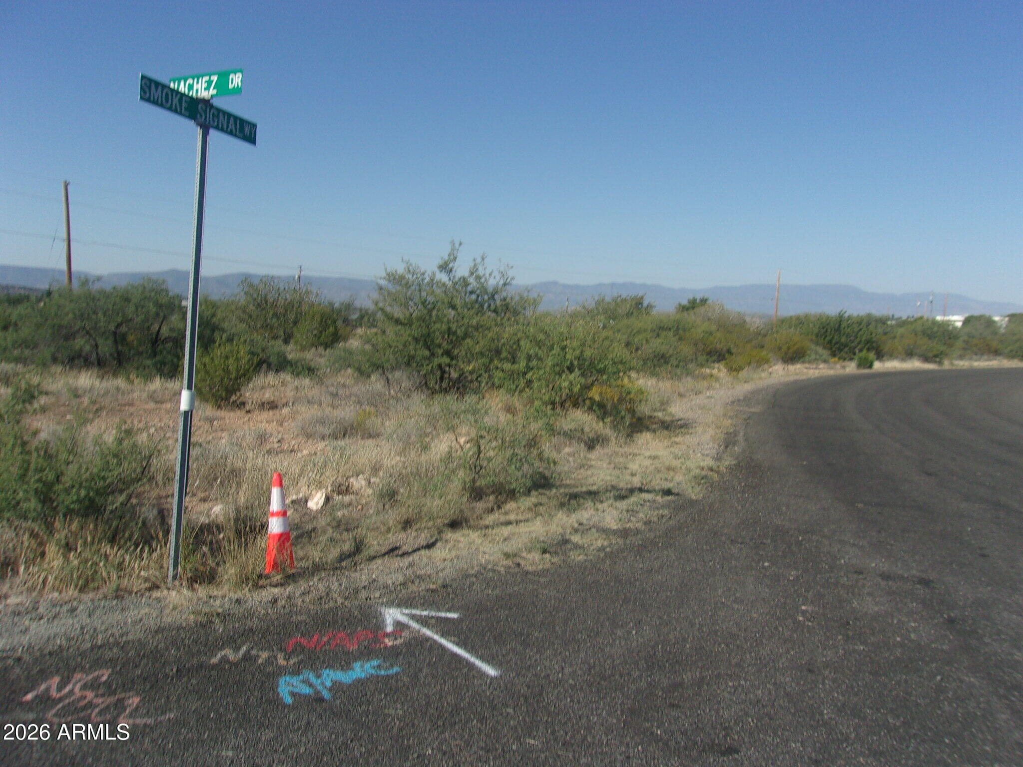 a view of a road with a yard