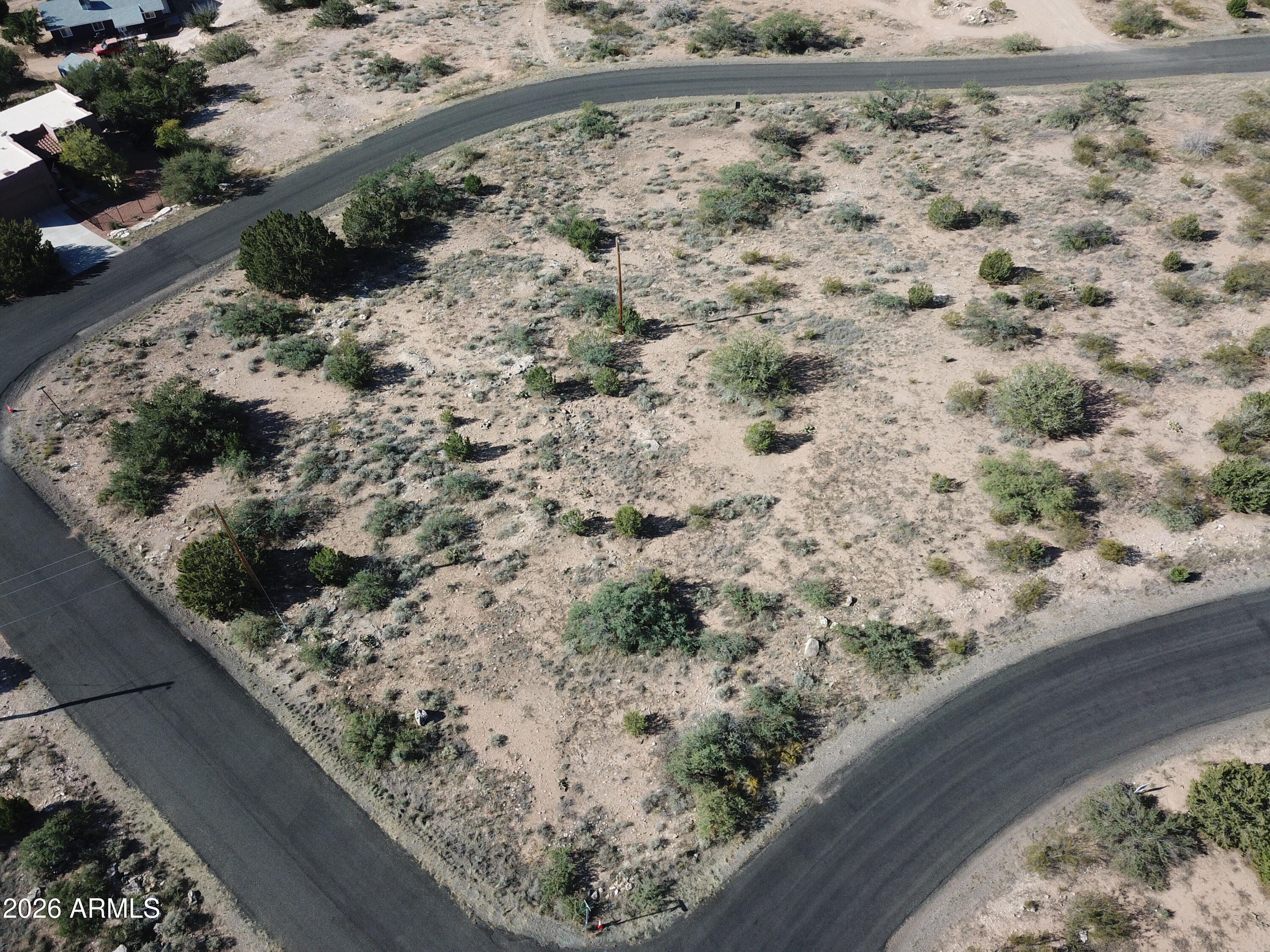 4875 Smoke Signal Way, Unit 103 Rimrock, AZ 86335 - Photo 12 of 15 a view of a yard with wooden fence